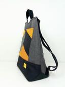 mochila antirrobo artesanal en tela en gris y amarillo